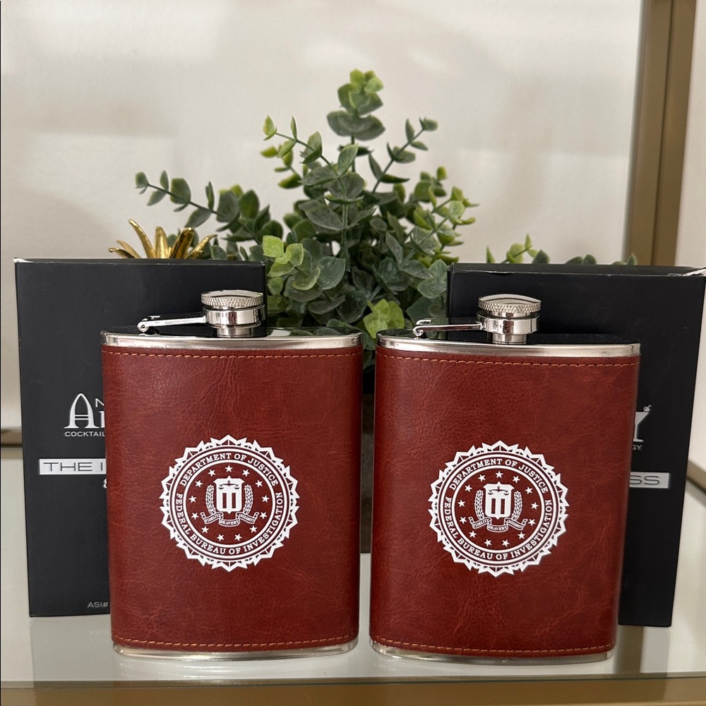 Set of two Brown Leather Flasks with Emblem